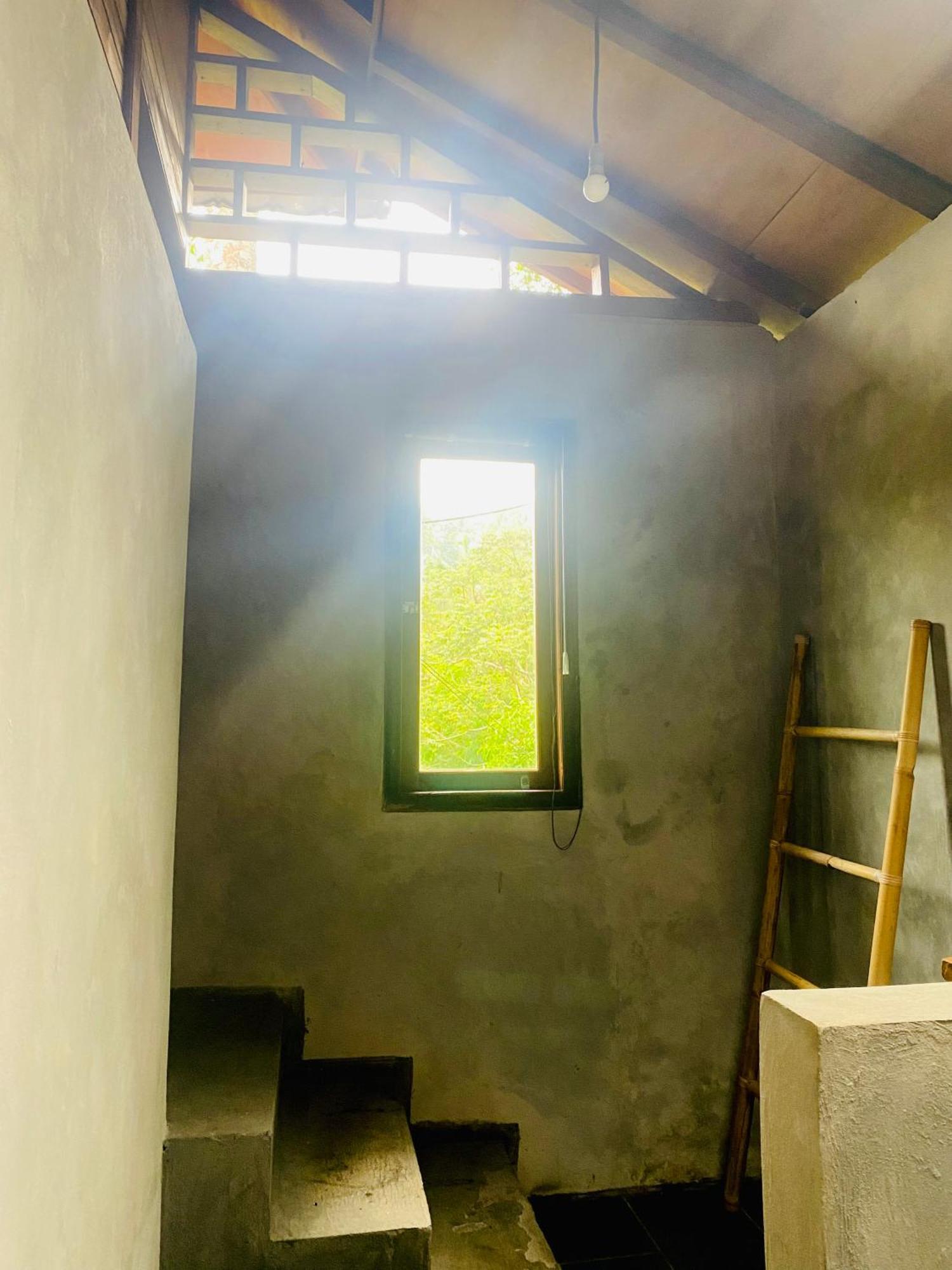 Uma D'Nyuh Homestay 新加拉惹 外观 照片
